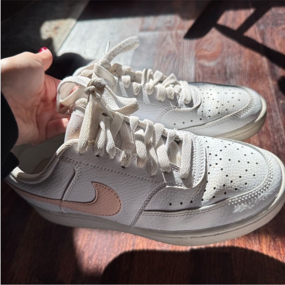Nike pink low top sneakers
